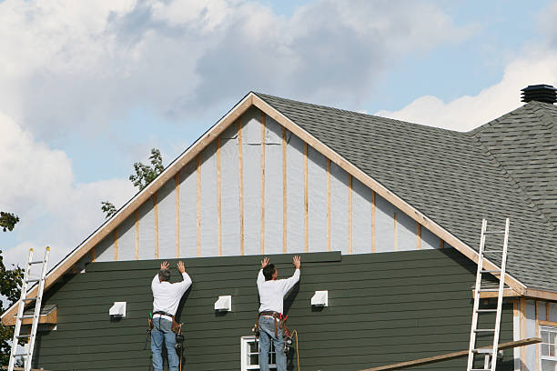 Professional Siding Replacement technician working in Wyandanch, NY